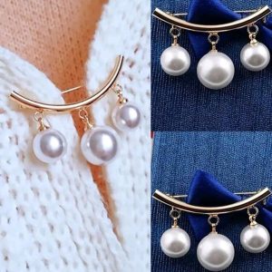 Prendedor de perlitas en forma de imperdible