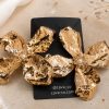 Aretes XL en forma del flor dorados